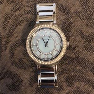 Silver Michael Kors watch with blue face